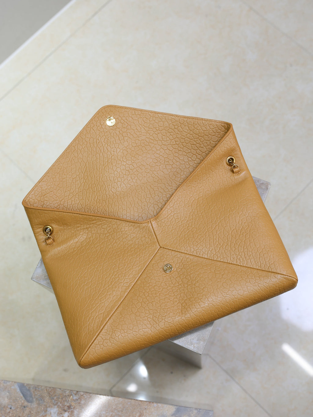 YSL 25S CASSANDRE ENVELOPE MESSENGER 35 IN GOLDEN BROWN LAMBSKIN GOLD HARDWRE