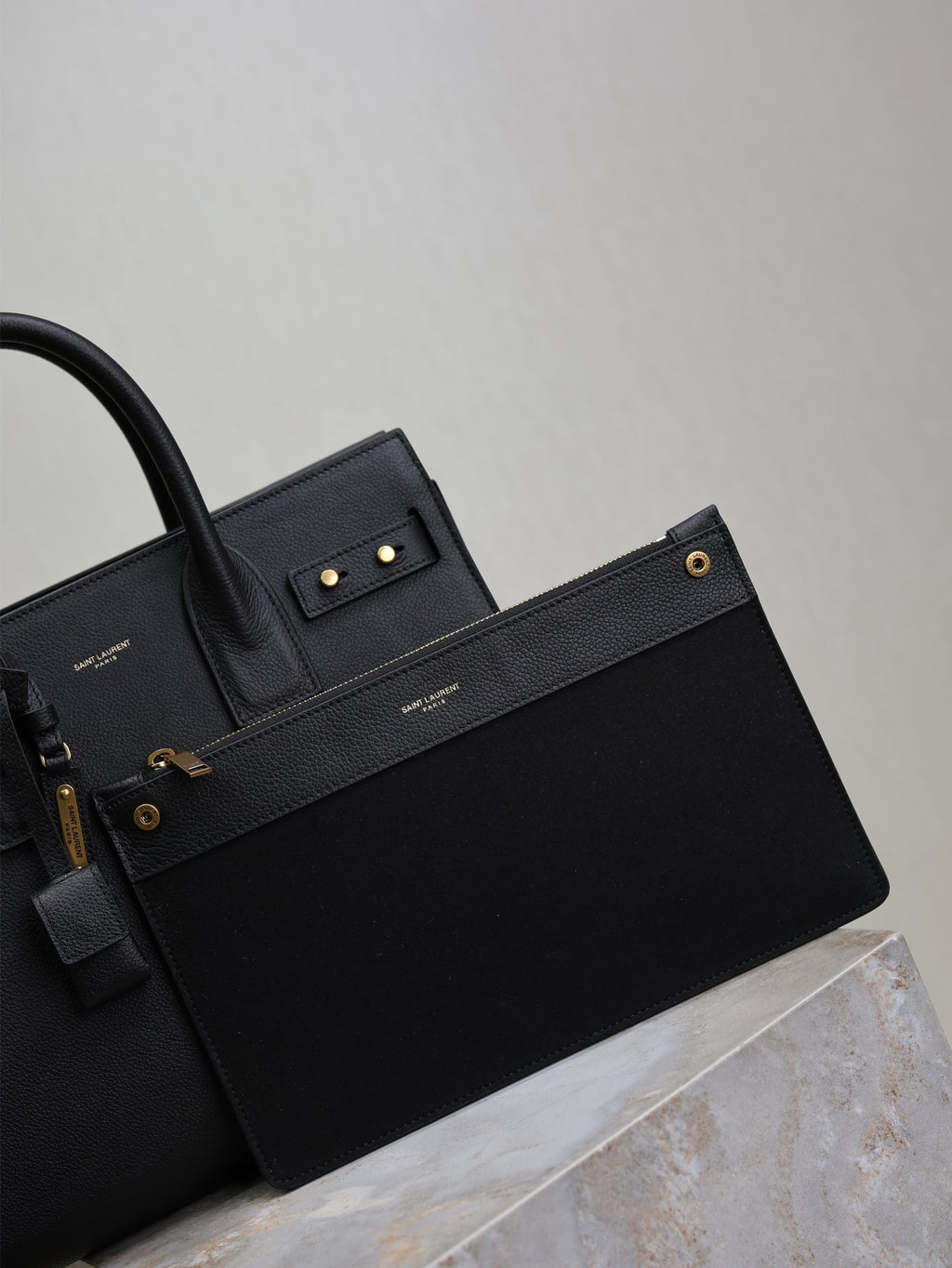 YSL 25S SAC DE JOUR GM 32 IN BLACK SUPPLE GRAINED CALFSKIN GOLD HARDWARE