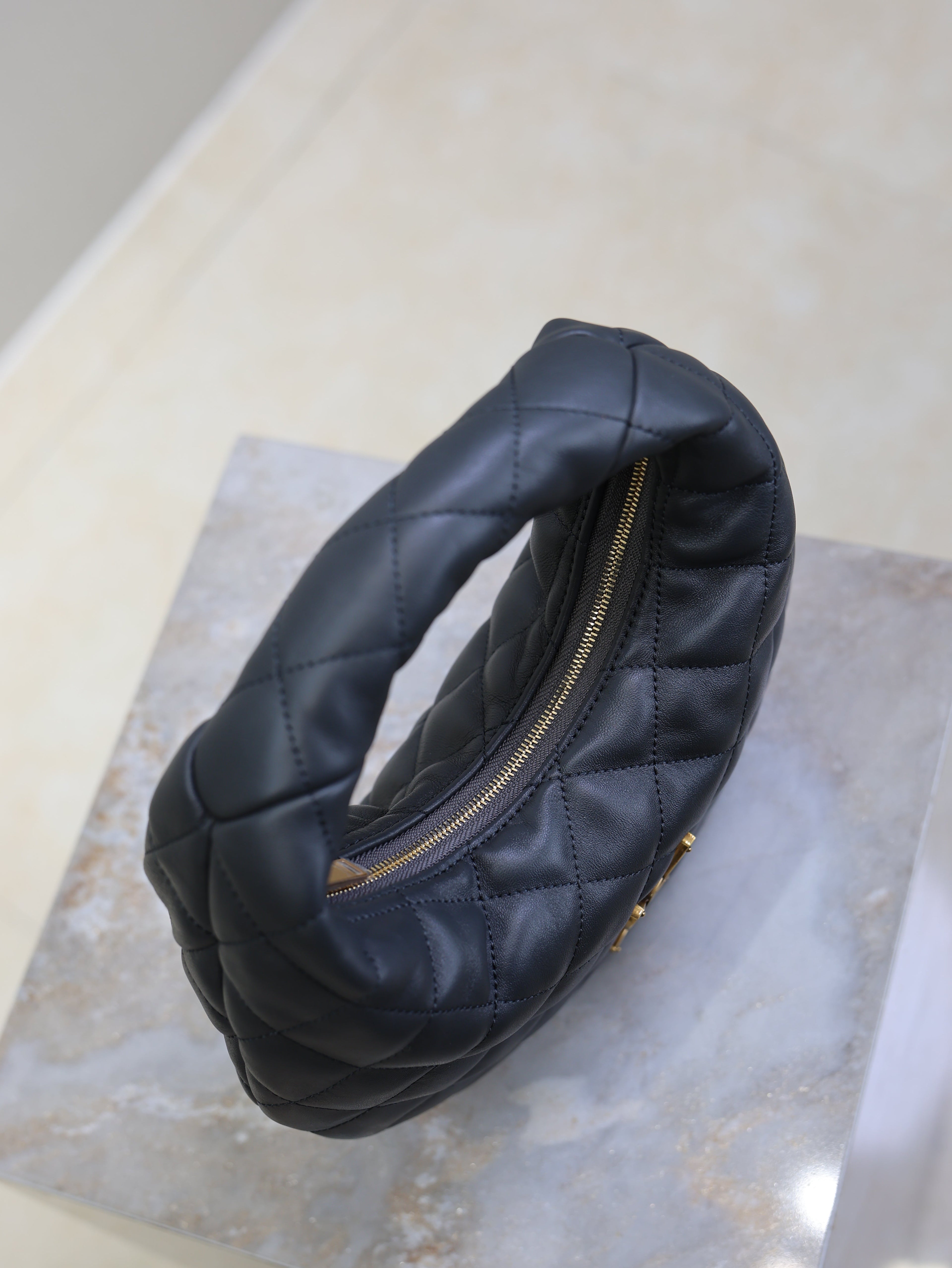YSL 25S ICARINO 17 IN BLACK QUILTED CALFSKIN GOLD HARDWARE
