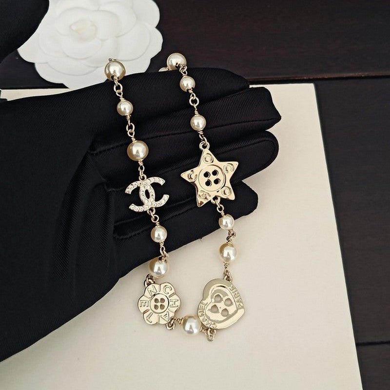 18K  Chanel Pearl Star Necklace