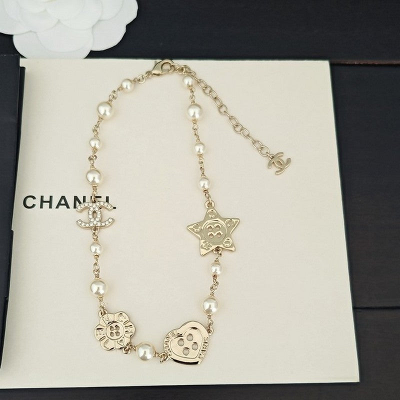 18K  Chanel Pearl Star Necklace