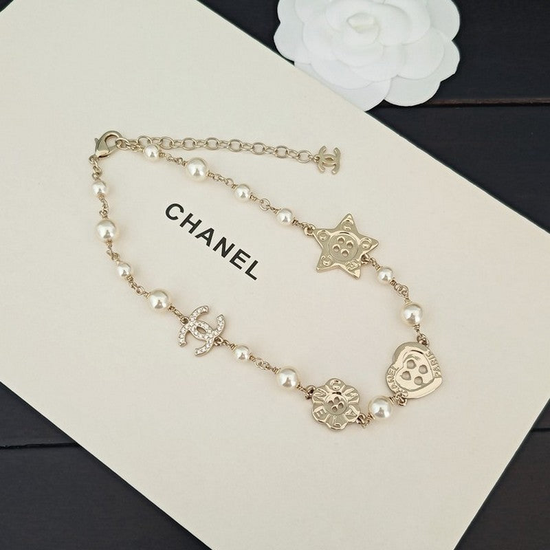 18K  Chanel Pearl Star Necklace