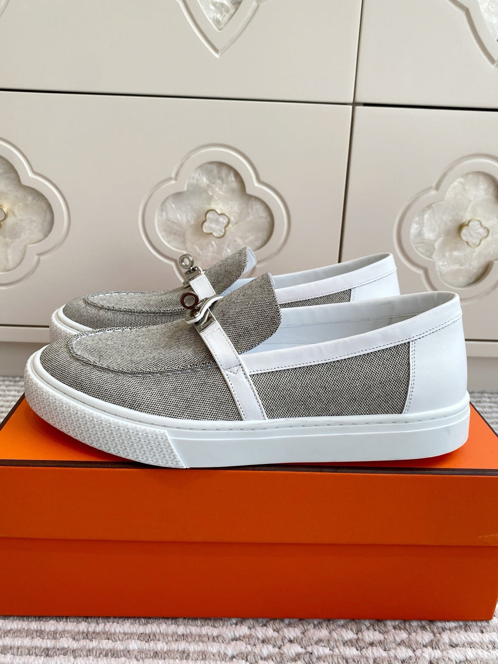 HERMES 25S SLIP-ON IN LIGHT GREY CANVAS WITH SILVER HARDWARE