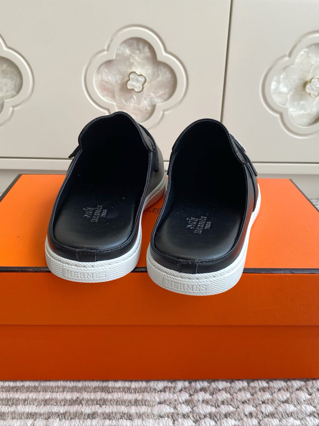 HERMES 25S MULES IN BLACK LAMBSKIN WITH SILVER HARDWARE