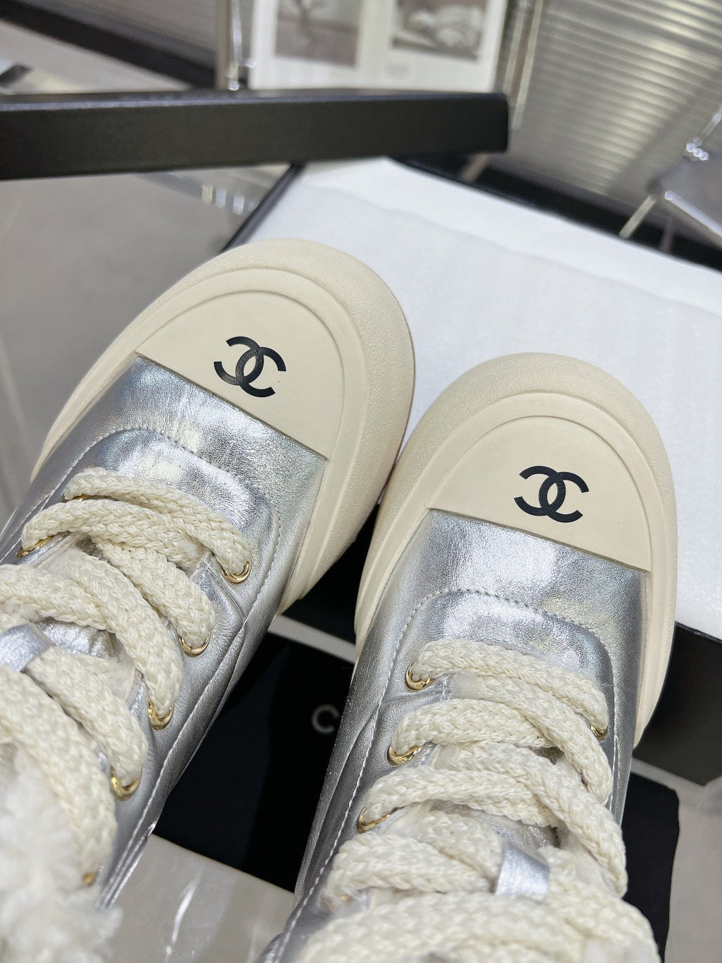 CHANEL MARTIN BOOTS IN SILVER CALFSKIN AND LAMB FUR LINING