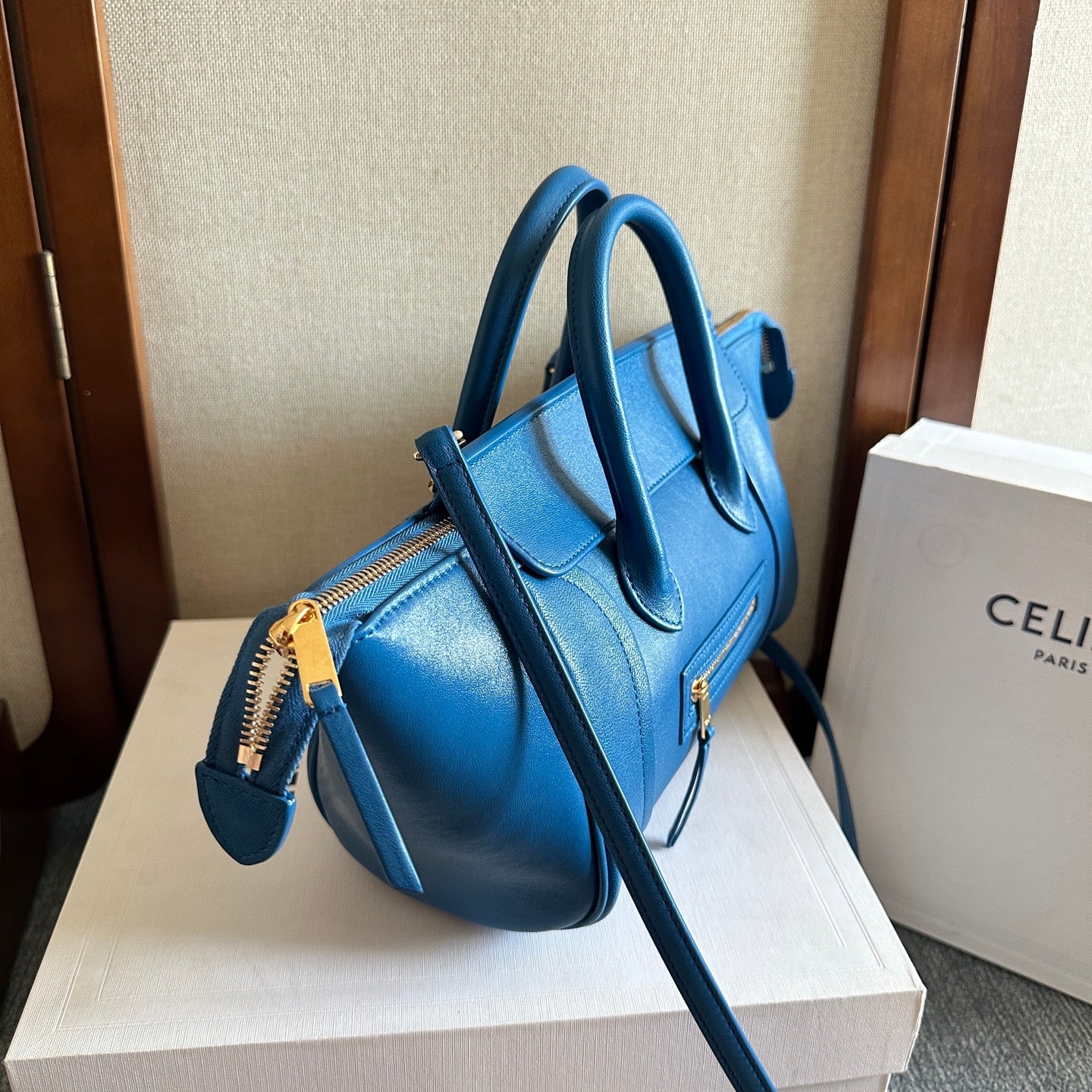 CELINE 25S NEW LUGGAGE 36MM IN DARK BLUE CALFSKIN GOLD HARDWARE