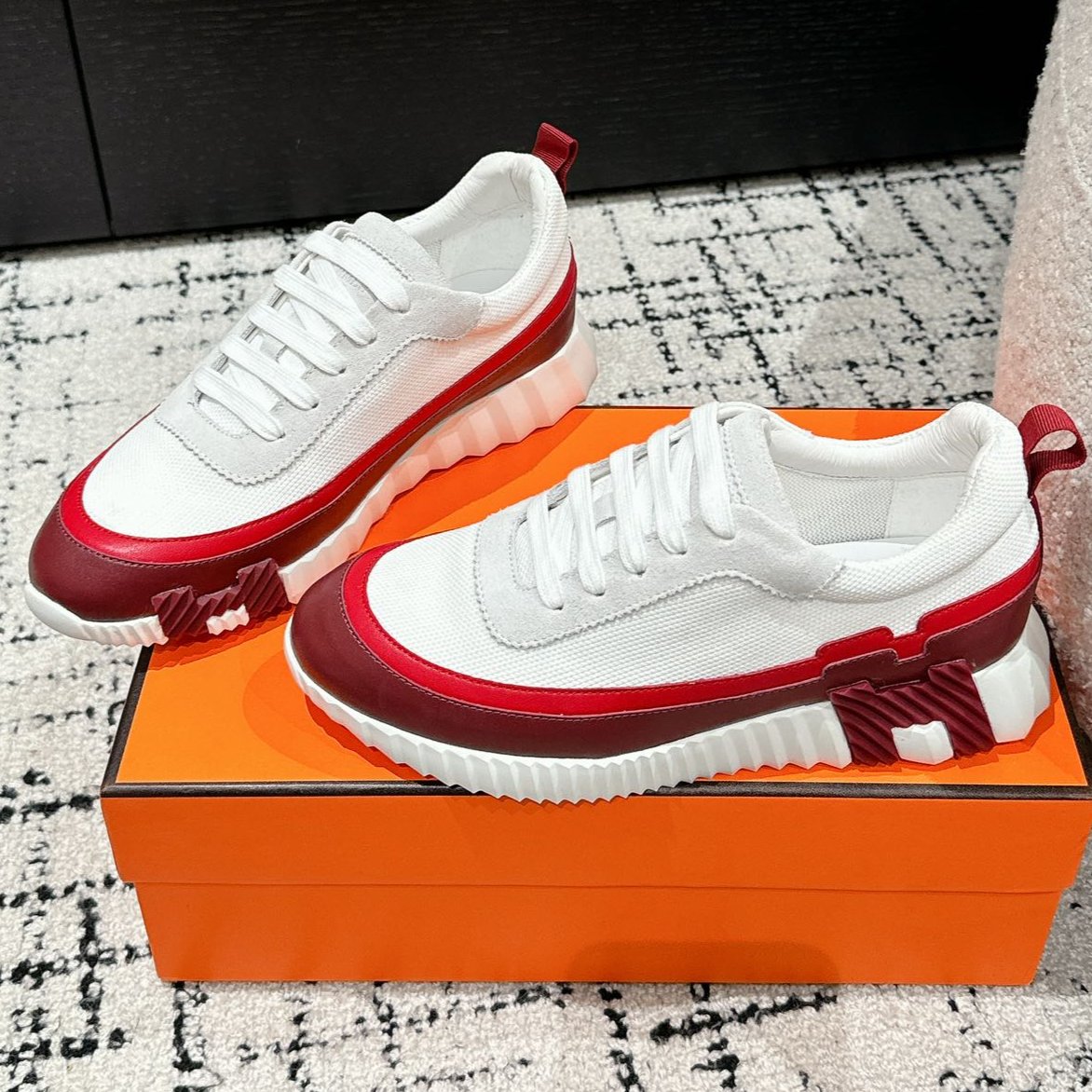 HERMES BOUNCING SNEAKER IN WINE RED CALFSKIN AND WHITE FABRIC