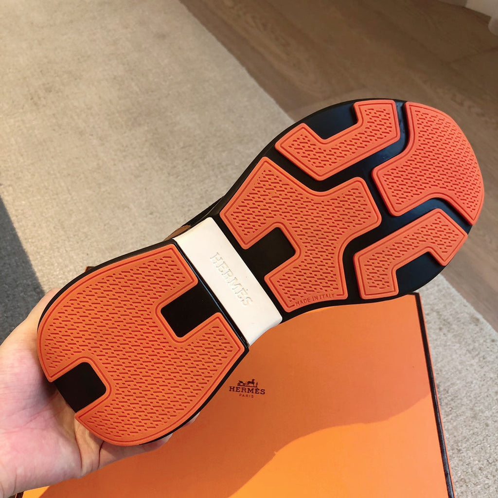 HERMES HEROS SNEAKER IN BLACK BREATHABLE MESH FABRIC AND BRONZE BROWN CALFSKIN