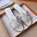 HERMES 0RAN SANDALS IN WHITE CALFSKIN