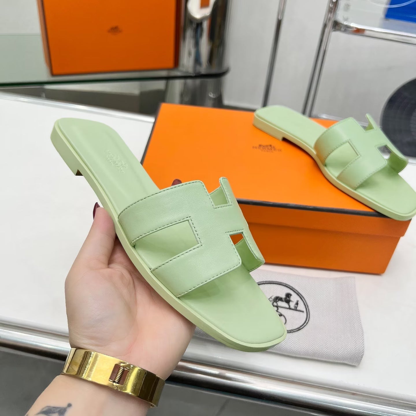 HERMES 0RAN SANDALS IN GREEN PASTEL CALFSKIN
