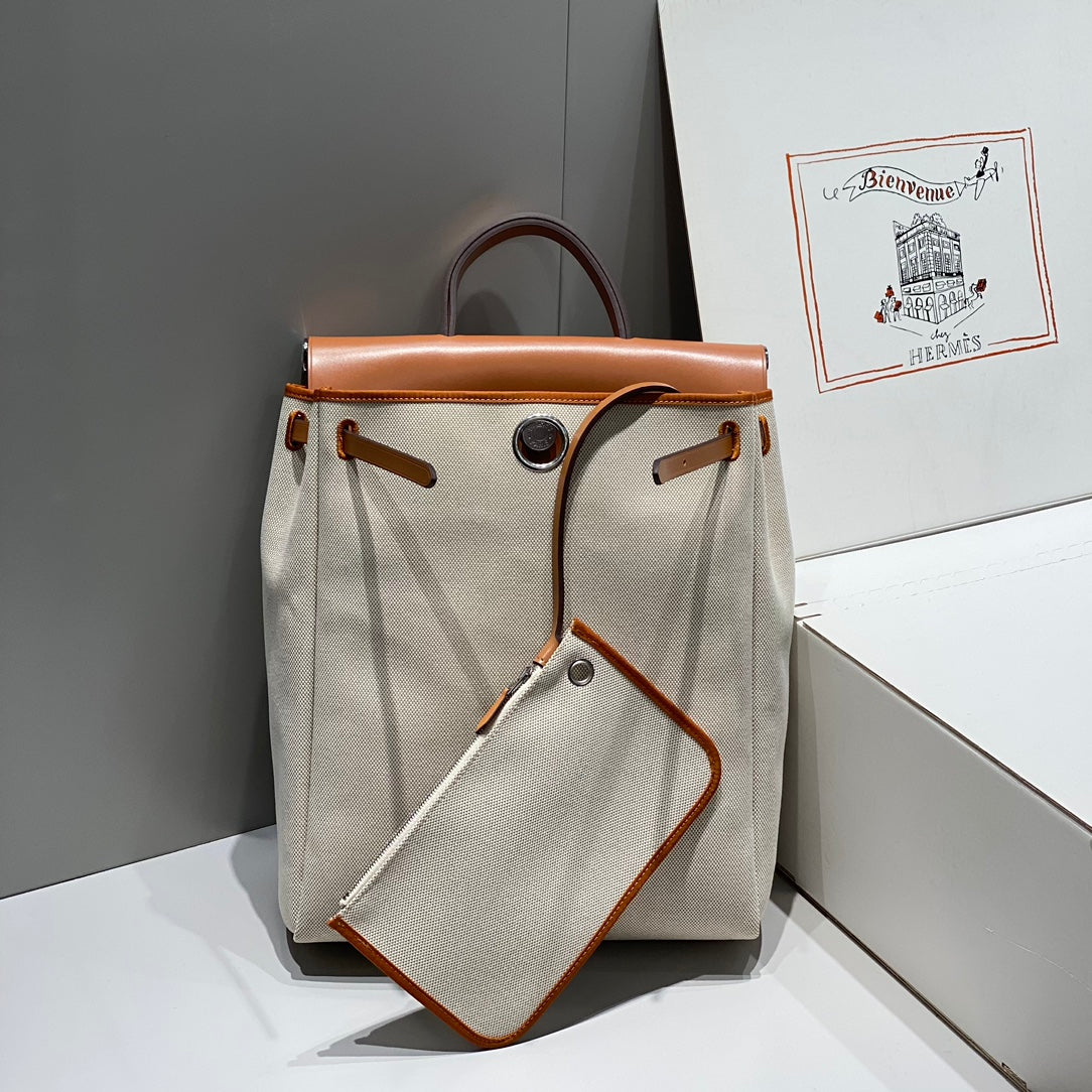 HERMES HERBAG A DOS ZIP RETOURNE BACKPACK 29 IN OFF-WHITE CANVAS AND BROWN CALFSKIN