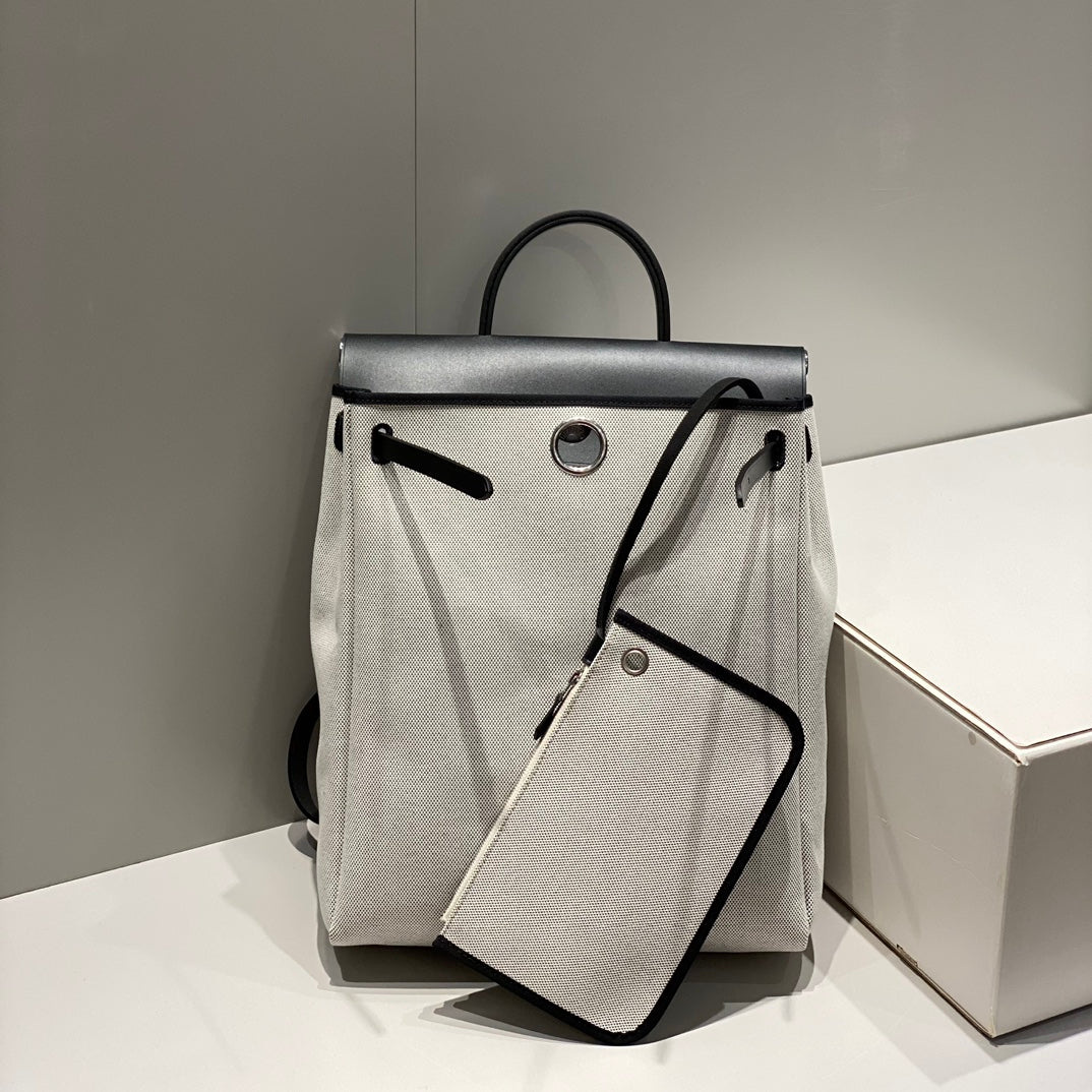 HERMES HERBAG A DOS ZIP RETOURNE BACKPACK 29 IN OFF-WHITE CANVAS AND BLACK CALFSKIN