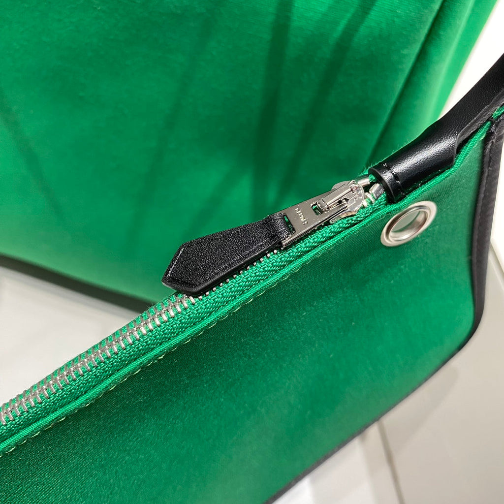 HERMES HERBAG A DOS ZIP RETOURNE BACKPACK 29 IN GREEN CANVAS AND BLACK CALFSKIN