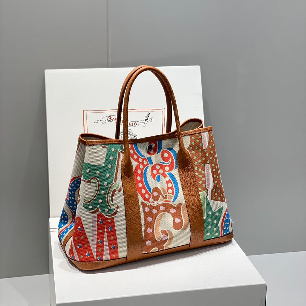 HERMES GARDEN PARTY 36 IN MULTICOLOR TOILE H CANVAS GOLD CALFSKIN CIRCUS TYPOGRAPHY PRINT