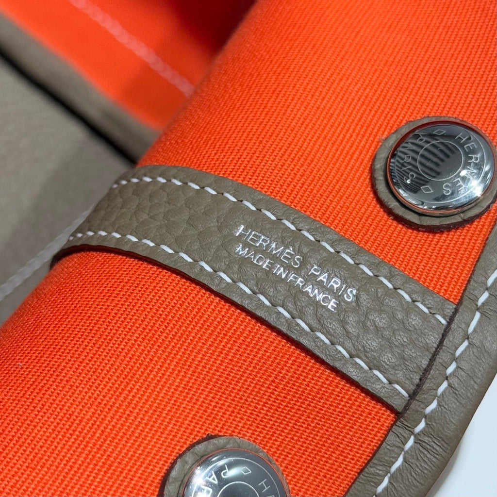HERMES GARDEN PARTY 30CM IN ORANGE MINIMUM TOILETS COTTON CANVAS AND BROWN CALFSKIN