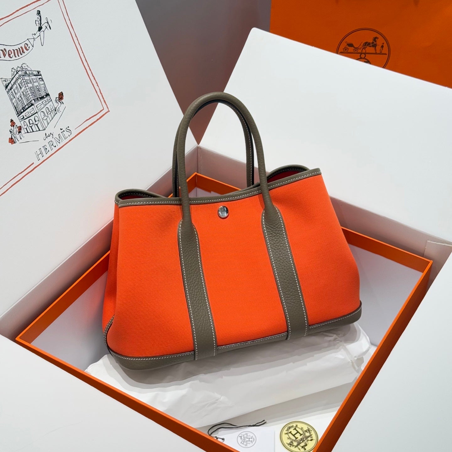 HERMES GARDEN PARTY 30CM IN ORANGE MINIMUM TOILETS COTTON CANVAS AND BROWN CALFSKIN