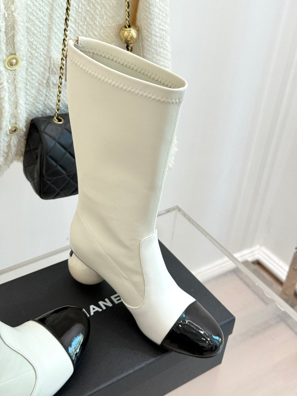 CHANEL PEARL BOOTS IN WHITE CALFSKIN