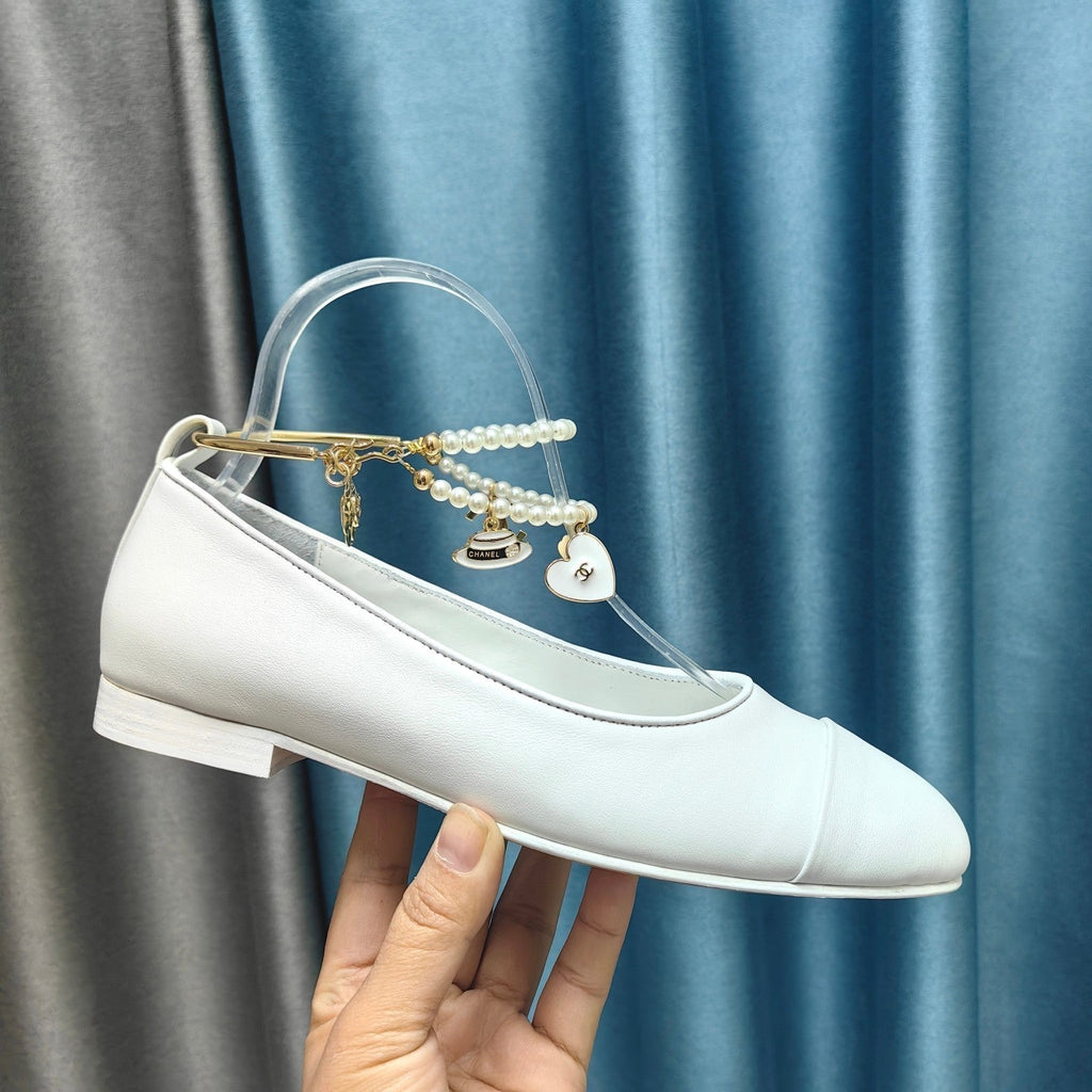 CHANEL MARY JANE WITH PEARL STRAP IN WHITE LAMBSKIN