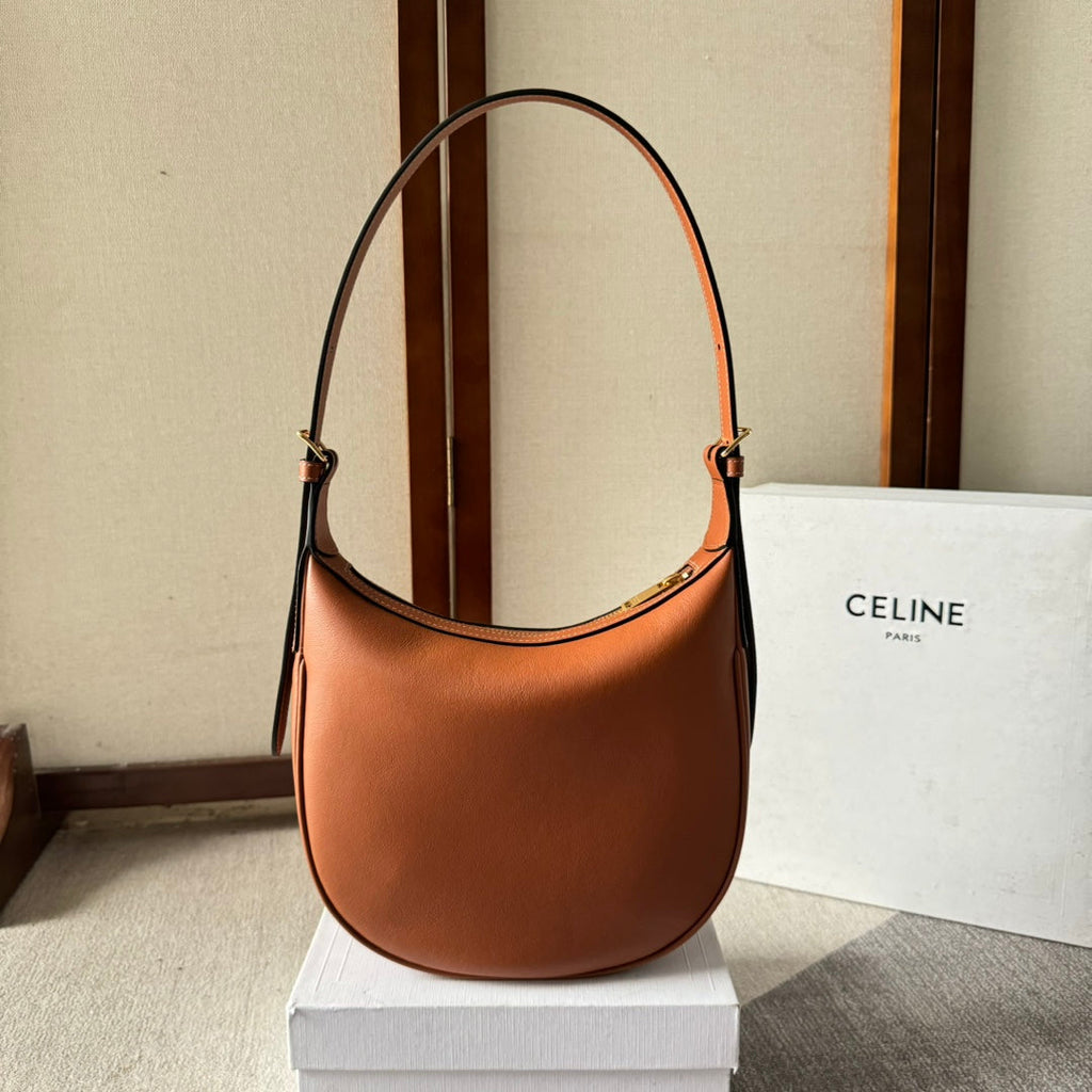 CELINE SMALL HELOÏSE BAG CUIR 22 IN GINGER ORANGE CALFSKIN EMBOSSED LOGO