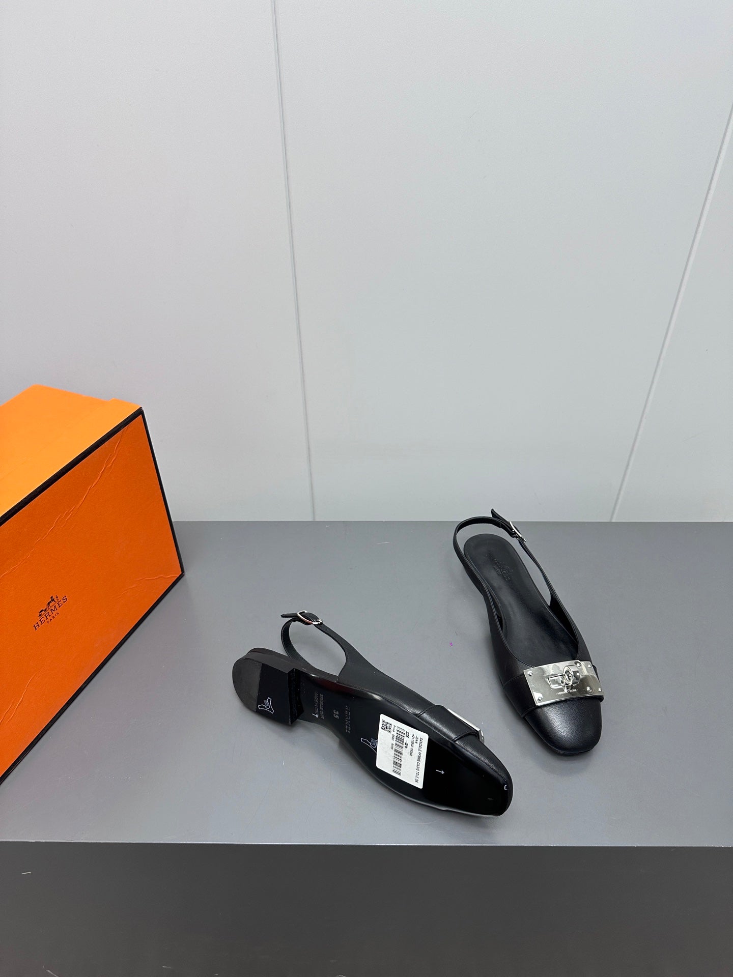 HERMES INNOCENTE SLINGBACK IN BLACK CALFSKIN