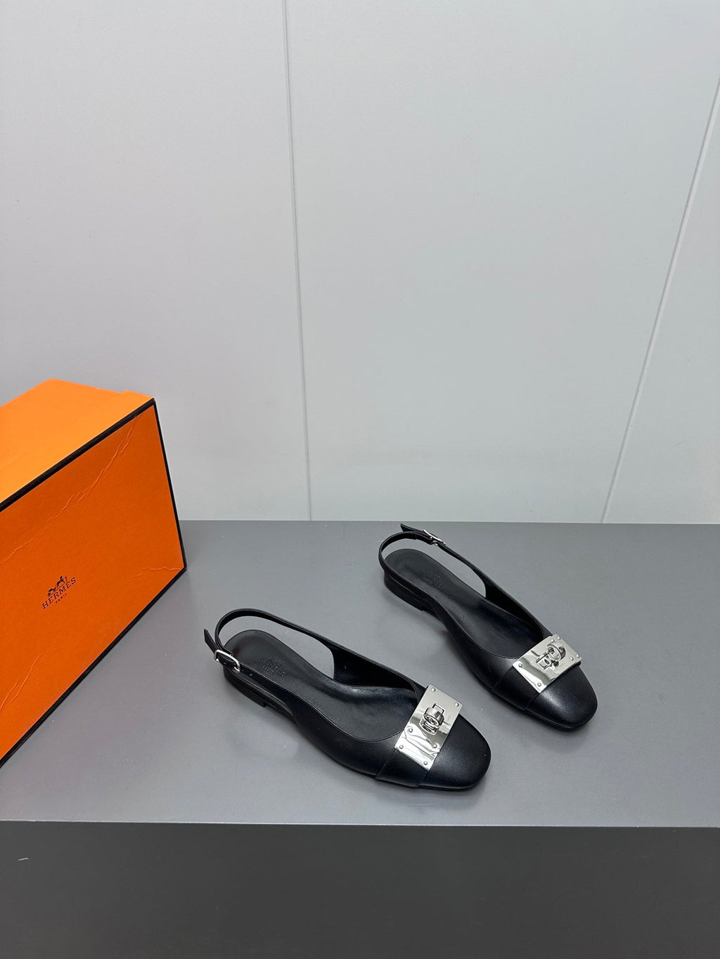 HERMES INNOCENTE SLINGBACK IN BLACK CALFSKIN