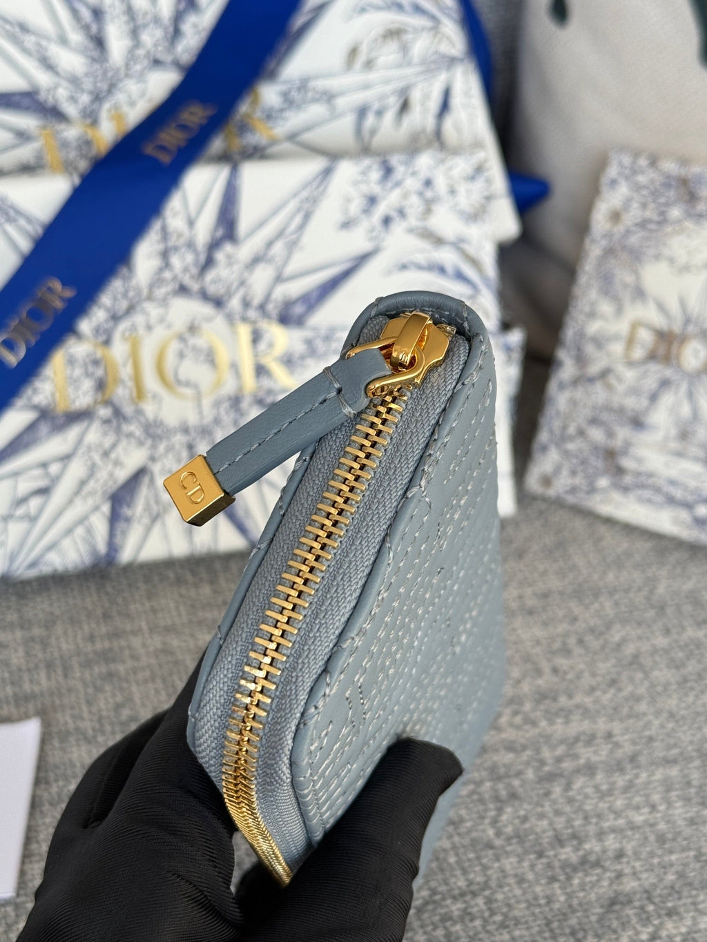 DIOR VERTICAL LONG ZIP WALLET 20 IN BABY BLUE QUILTED ALLOVER CALFSKIN