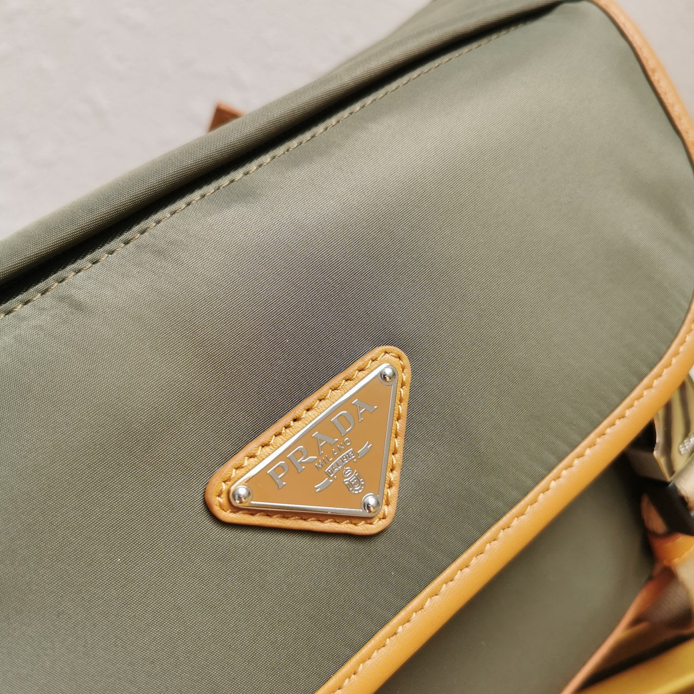 PRADA MESSENGER BAG 20 IN KHAKI GREEN RE-NYLON AND BROWN CALFSKIN TRIM
