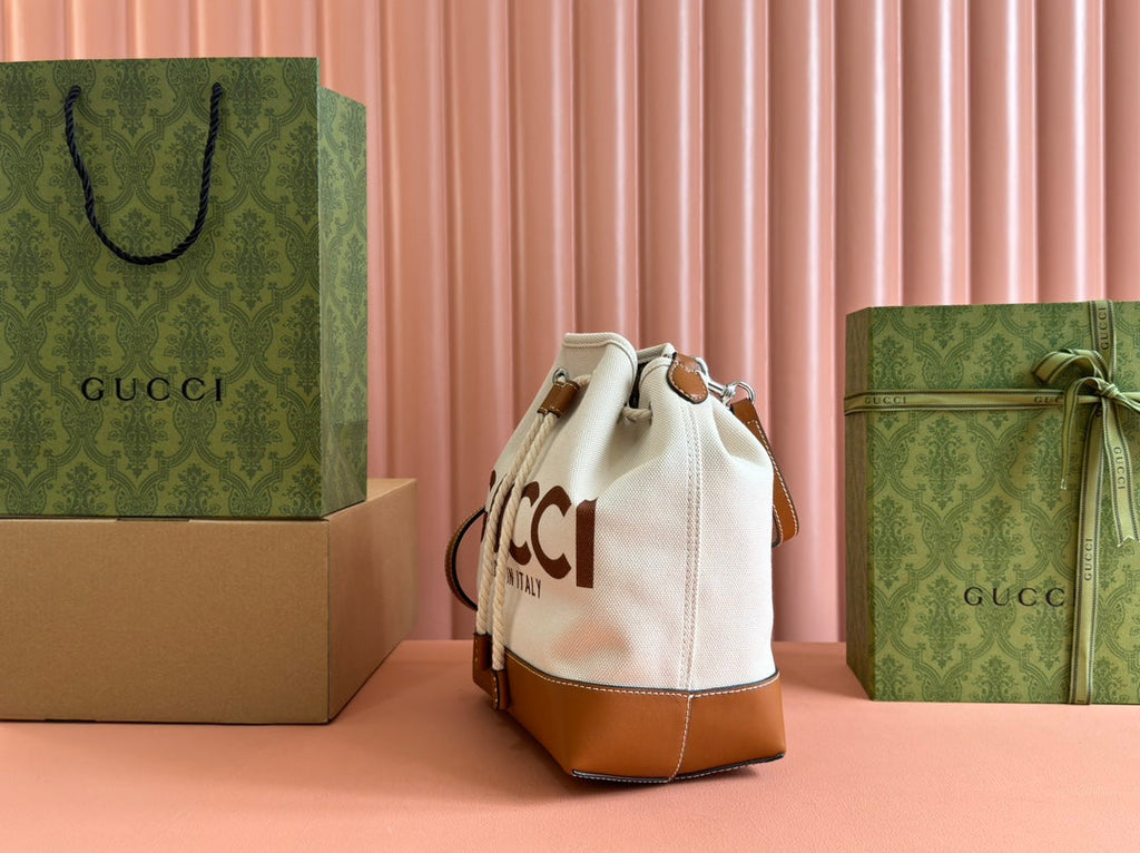 GUCCI DRAWSTRING SHOULDER BAG LOGO PRINT 31 IN WHITE CANVAS BROWN CALFSKIN