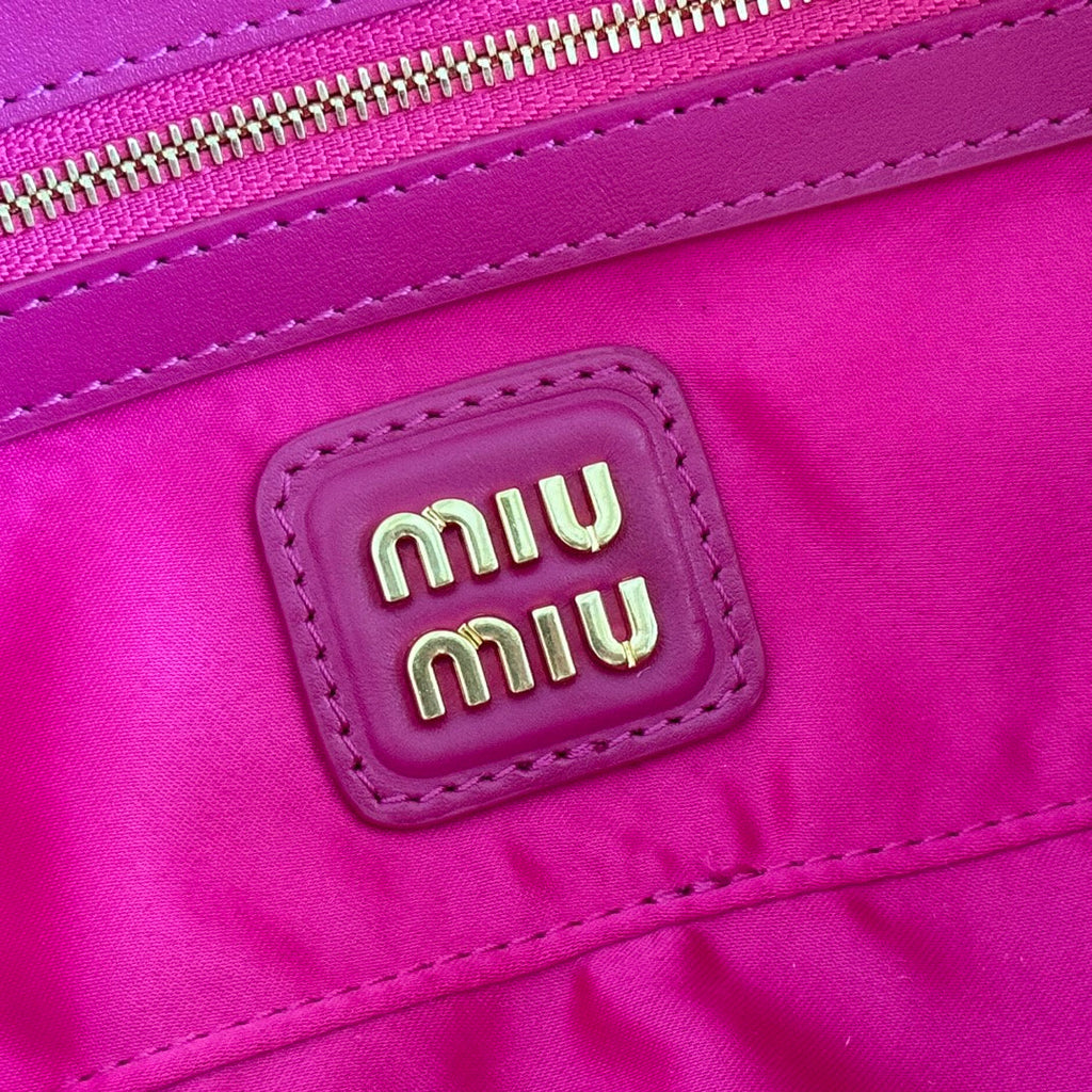 ARCADIE BAG 22 IN FUCHSIA SUEDE GOLD HARDWARE