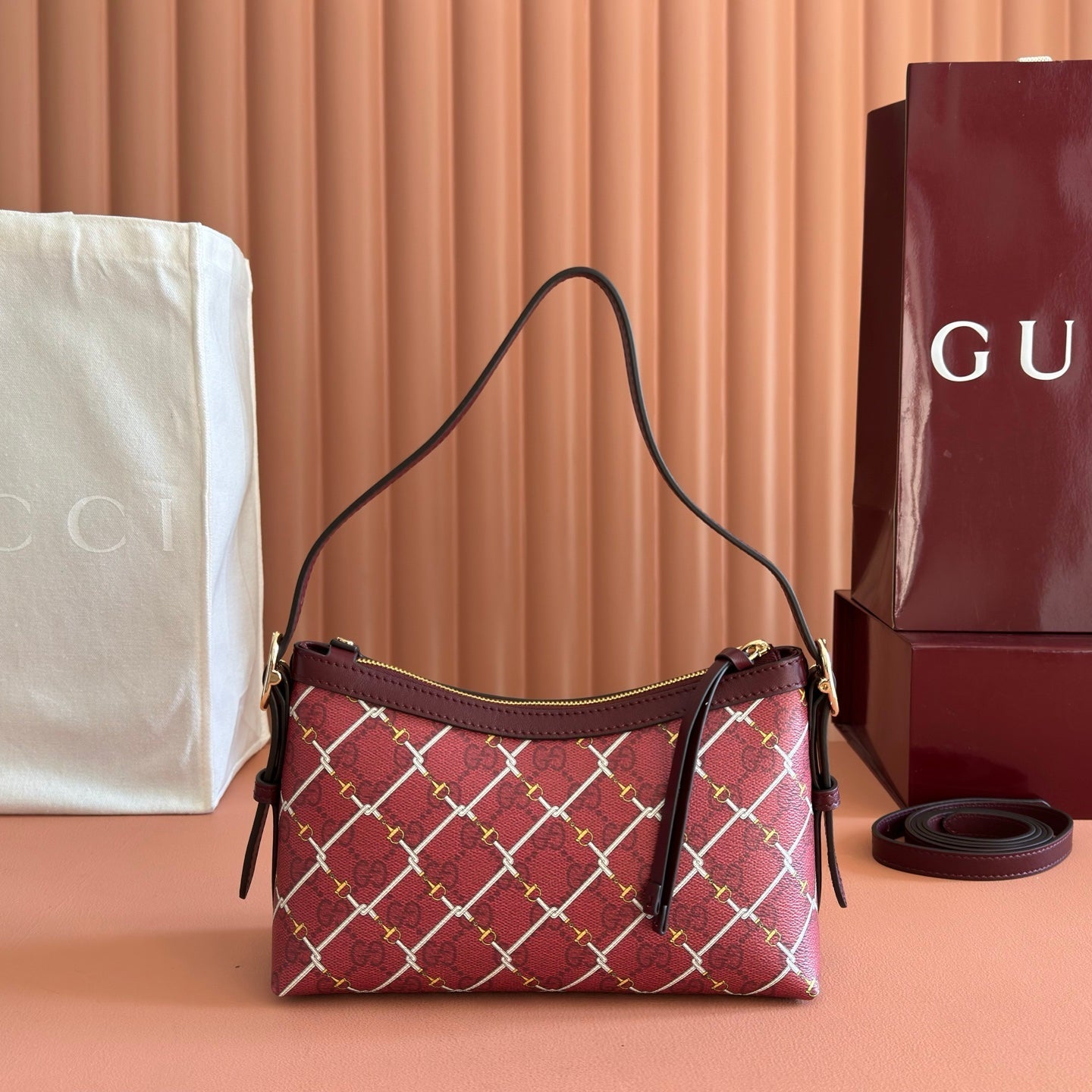 GUCCI 26S  EMBLEM BUCKET BAG 22 IN DARK RED COATED FABRIC