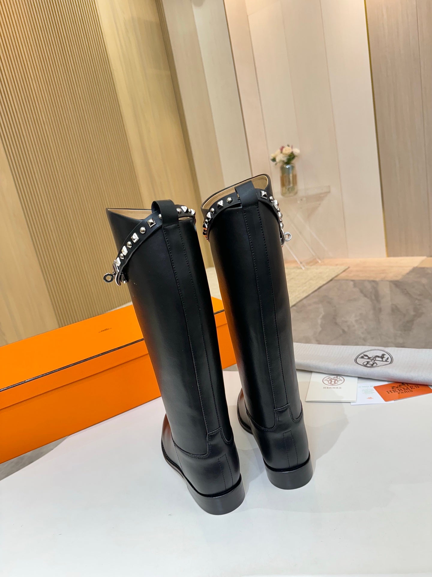 HERMES 25S KNEE-HIGH FLAT BOOTS IN BLACK LAMBSKIN WITH SILVER HARDWARE