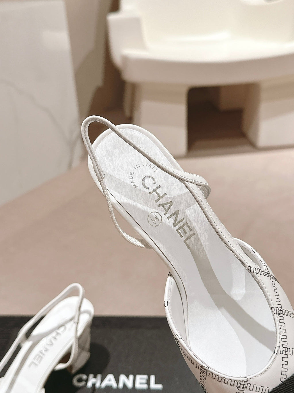 CHANEL HIGH SLINGBACKS IN WHITE LAMBSKIN AND BLACK SATIN