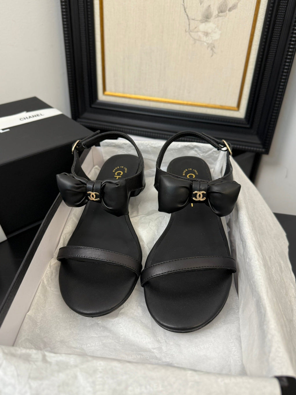 CHANEL FLAT SANDALS IN BLACK CALFSKIN WITH BOW