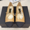CHANEL FLAT MARY JANE PUMPS IN SUN YELLOW LAMBSKIN MIX BLACK FABRIC