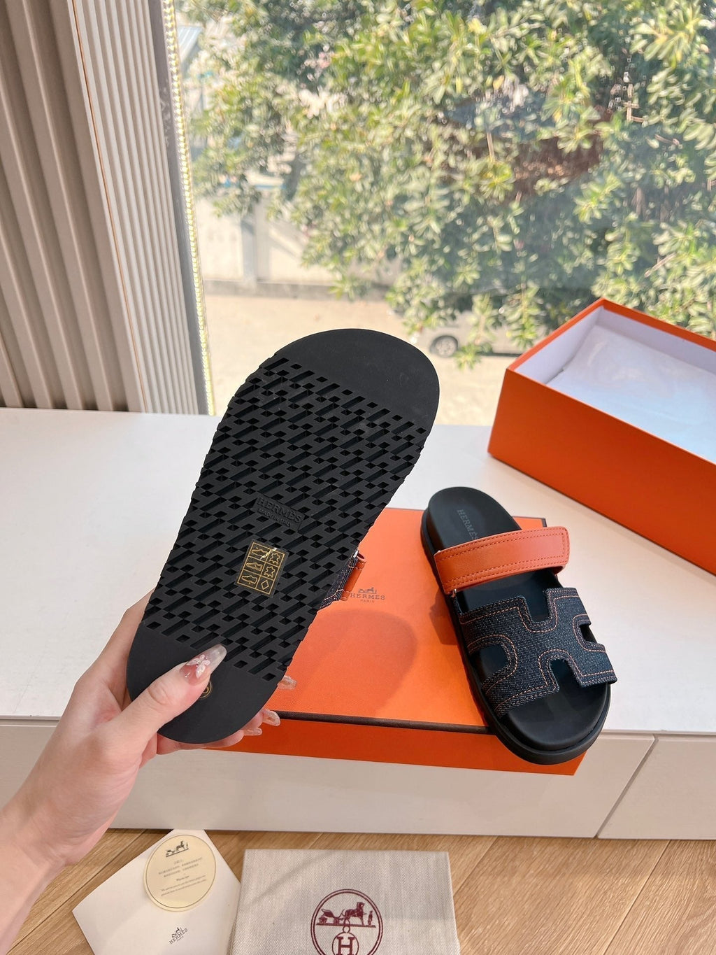 HERMES CHYPRE SANDAL IN BLACK DENIM AND VIVID ORANGE CALFSKIN