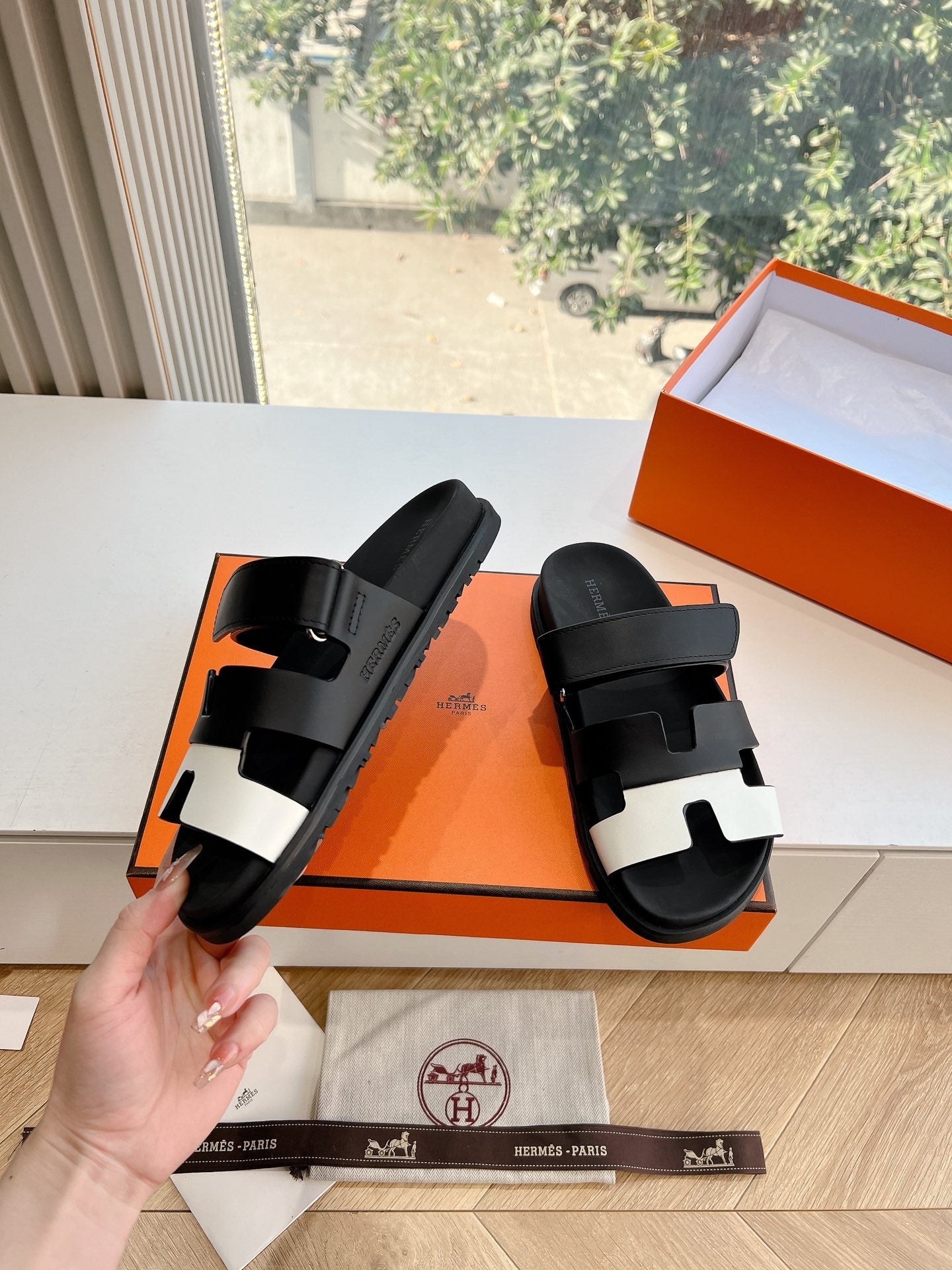 HERMES CHYPRE SANDAL IN BLACK MIX WHITE CALFSKIN