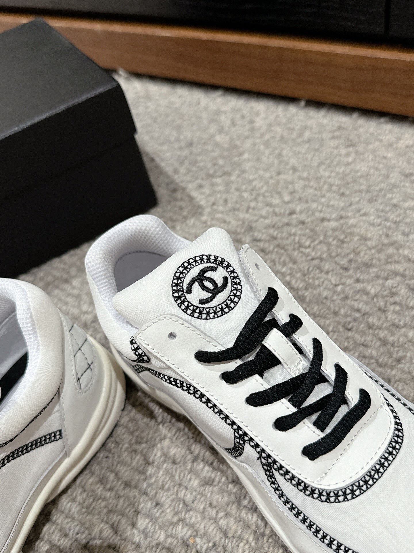 CHANEL CLASSIC TRAINER IN WHITE MIX BLACK FABRIC