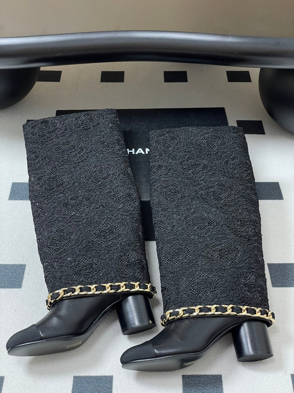 CHANEL FLORAL BOOTS 60MM IN BLACK CALFSKIN WITH GOLD CHAIN