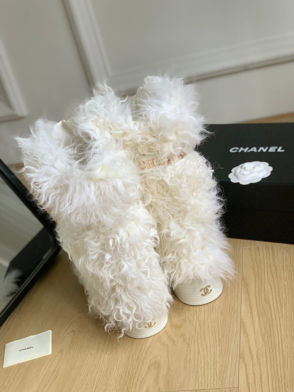CHANEL ANKLE HIGH BOOTS IN WHITE MIX BLACK WOOL FUR