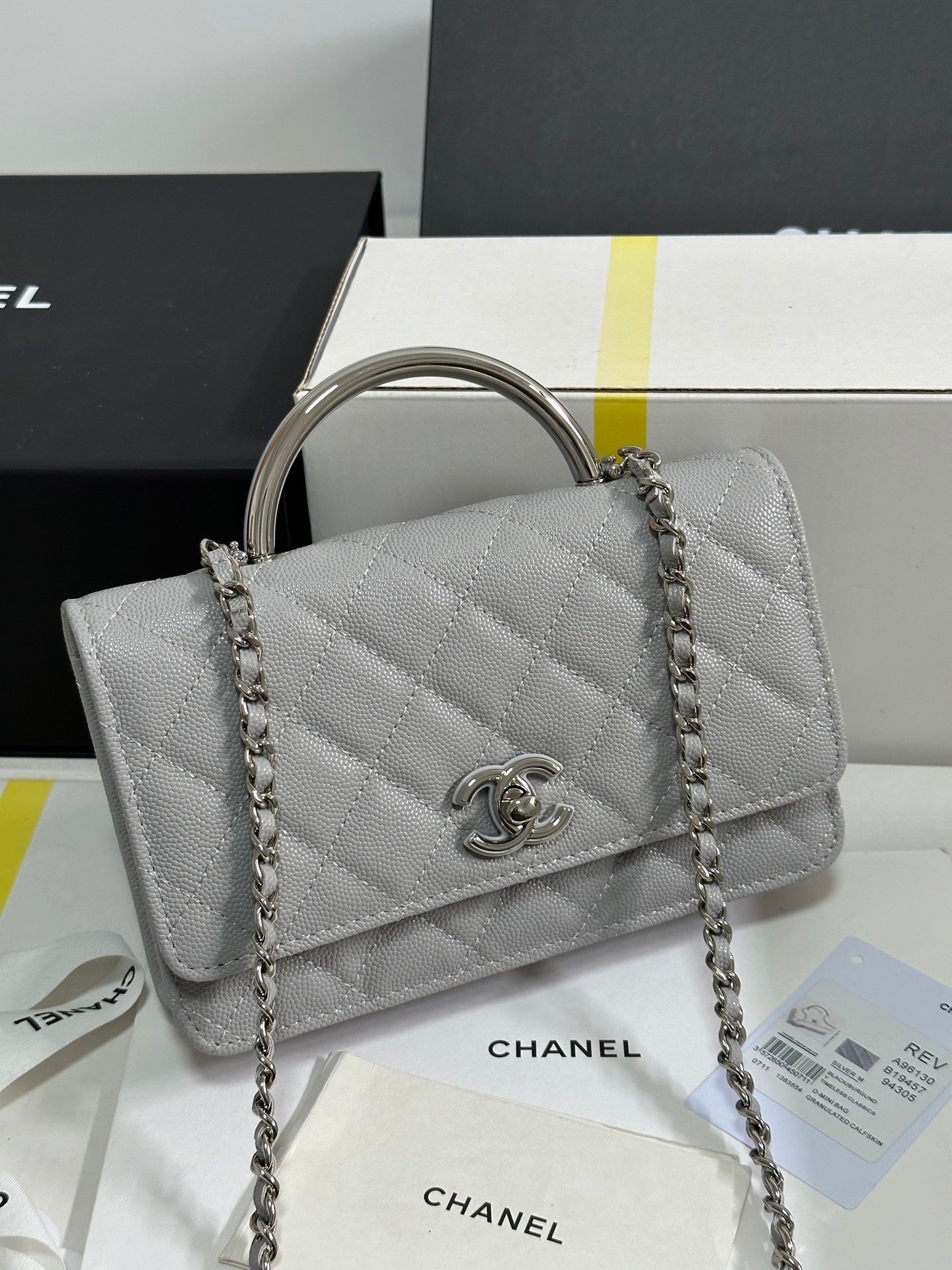 CHANEL FLAP BAG WITH SILVER-TONE HANDLE 19 IN GREY SHINY CAVIAR SKIN