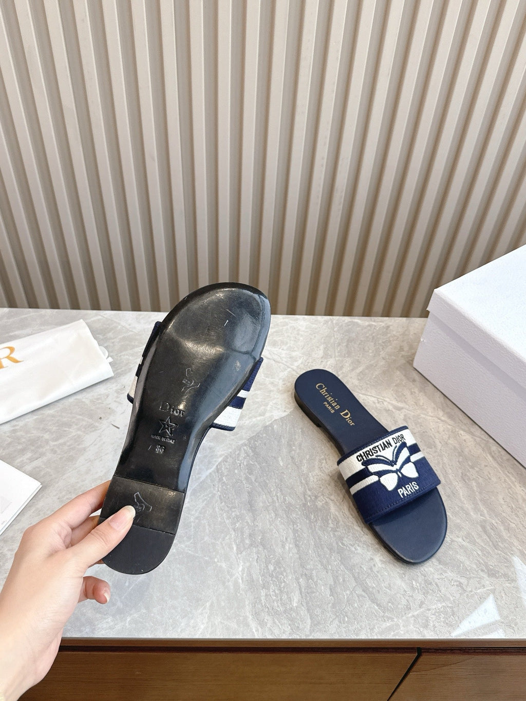 DIOR FLAT SLIDES 25S IN MIDNIGHT BLUE CALFSKIN AND FABRIC EMBROIDERED BUTTERFLY MOTIF