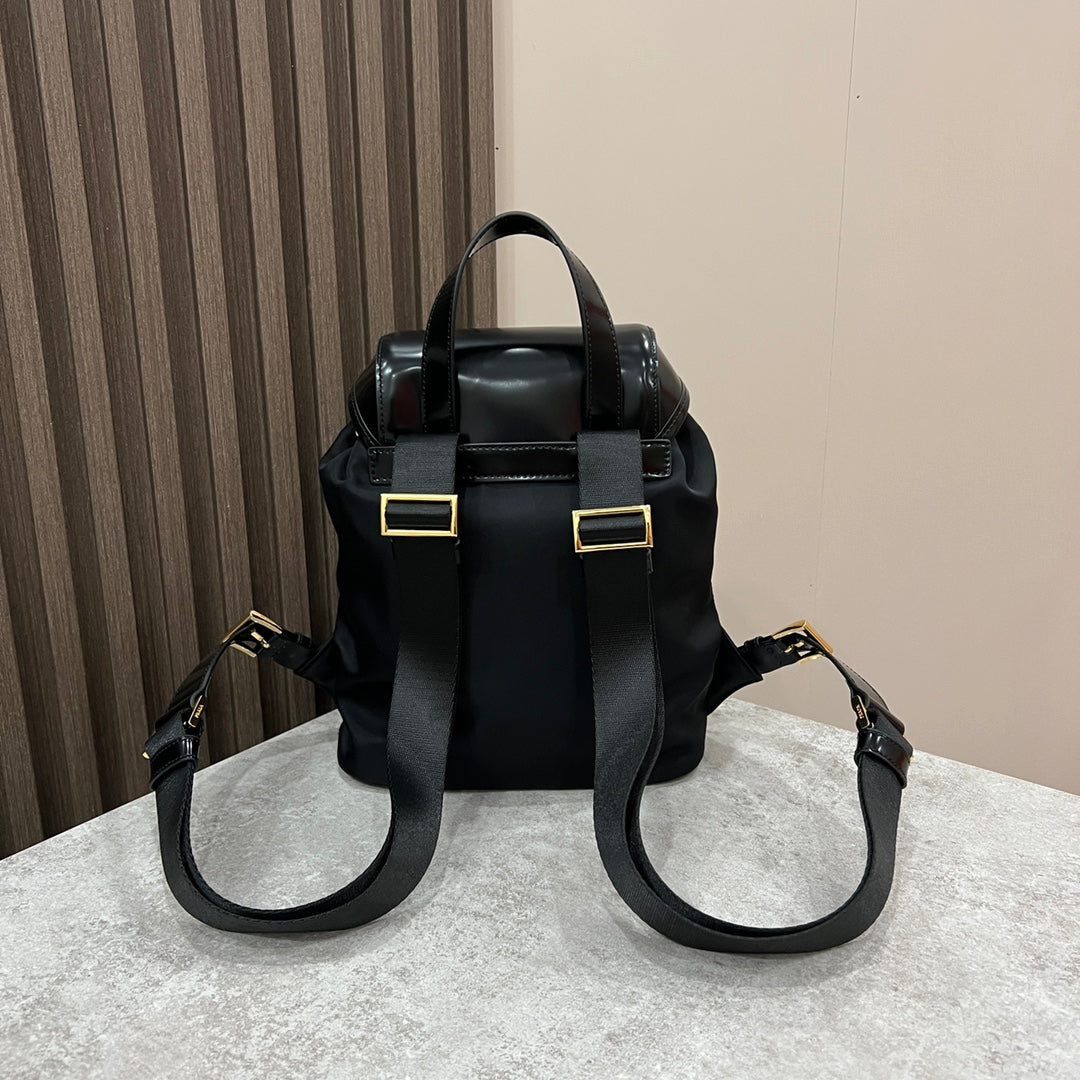 PRADA BACKPACK 25 IN BLACK RE-NYLON AND GLOSSY CALFSKIN GOLD HARDWARE