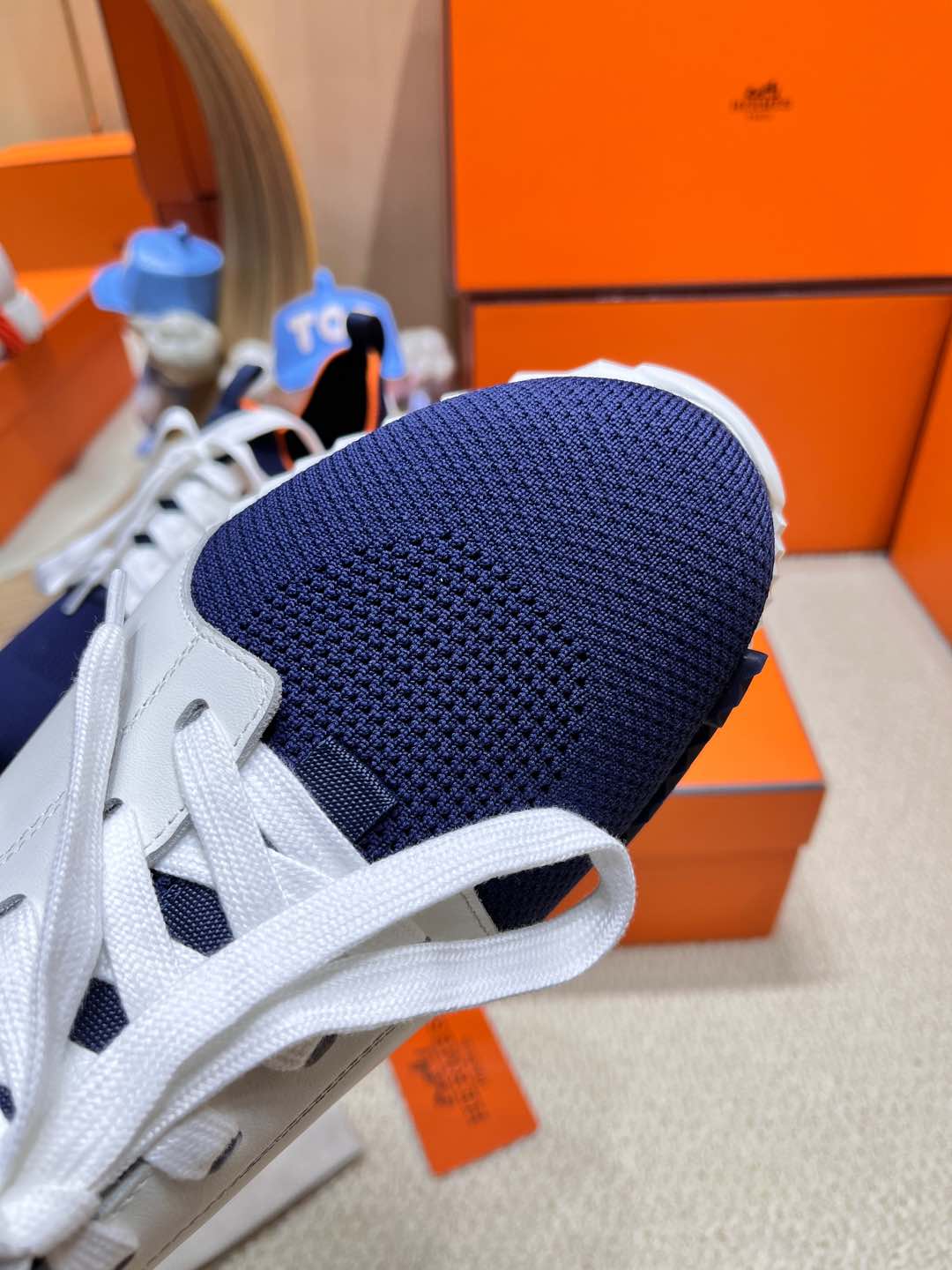 HERMES DEPART SLIP-ON SNEAKER IN NAVY BLUE KNIT AND WHITE CALFSKIN