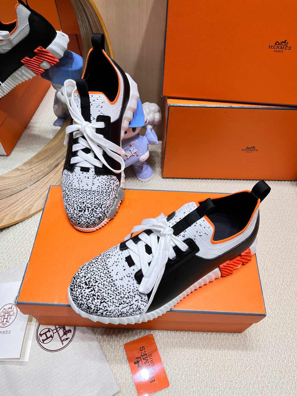 HERMES DEPART SLIP-ON SNEAKER IN WHITE MIX BLACK KNIT AND BLACK CALFSKIN