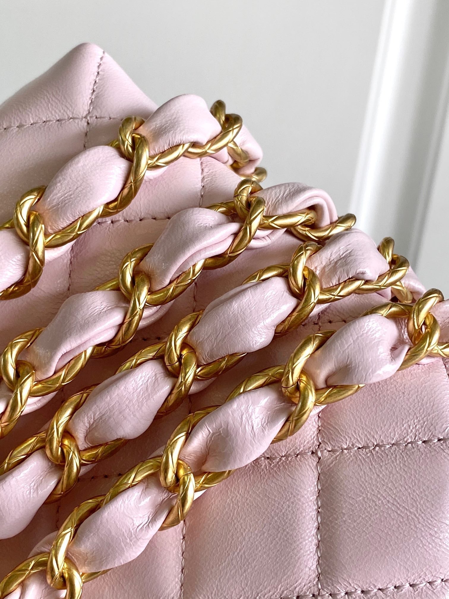 CHANEL MINI 13 CLUTCH WITH STRAP IN LIGHT PINK LAMBSKIN ATTACH BOW