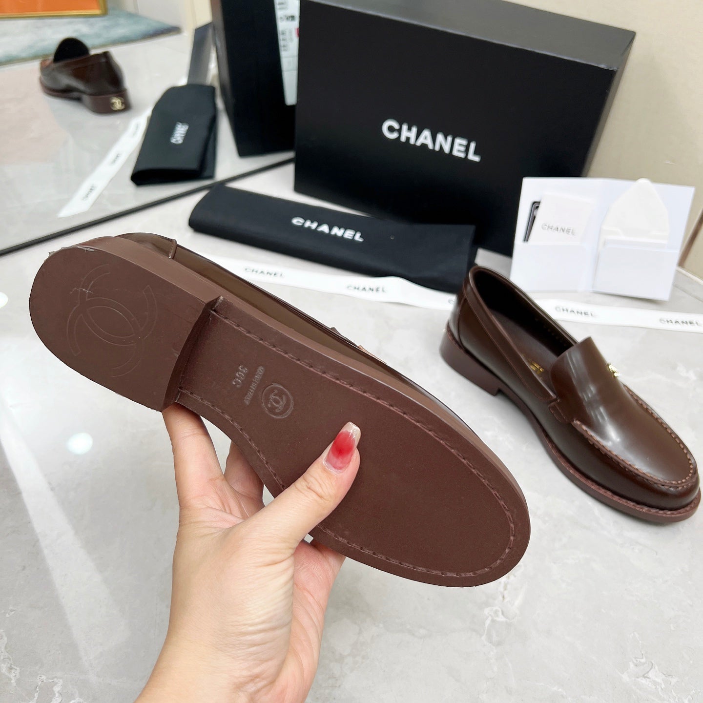 CHANEL MOASINS IN BROWN CALFSKIN