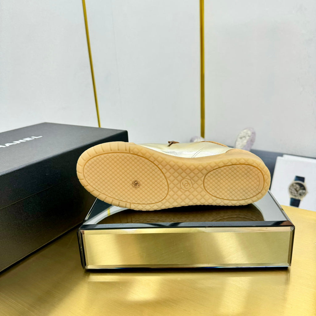 CHANEL SNEAKER IN GOLD CALFSKIN AND SUEDE