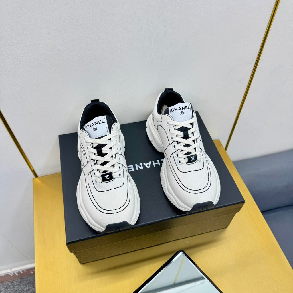 CHANEL SNEAKER IN WHITE MIX BLACK BREATHABLE FABRIC