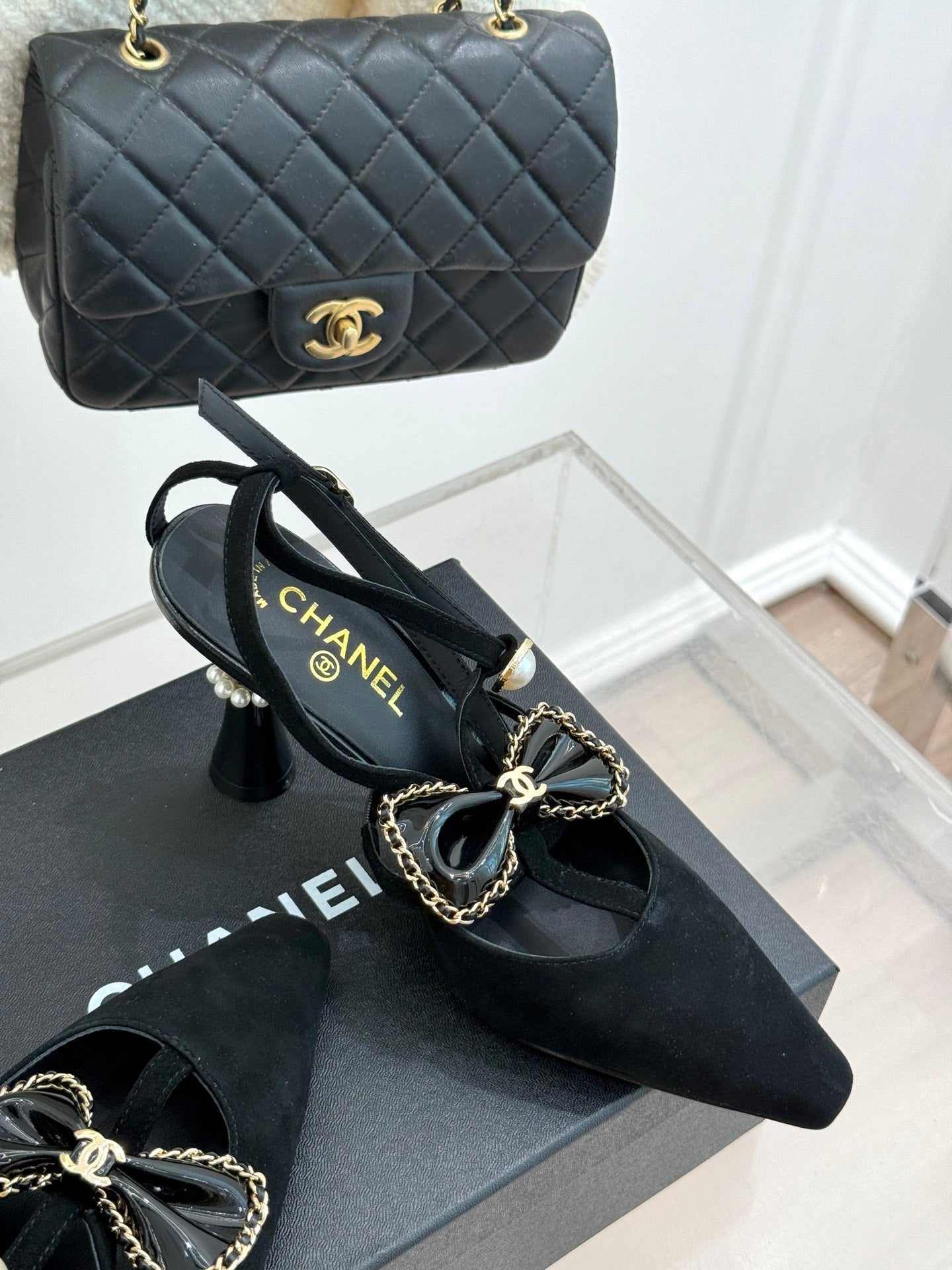 CHANEL CHAIN BOW HIGH HEEL 8 CM SLINGBACKS IN BLACK SUEDE