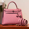 HERMES KELLY SELLIER 25 BAG IN SALMON PINK OSTRICH LEATHER WITH GOLD HARDWARE